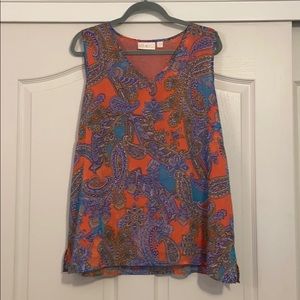 Bella Kim Gravel. Floral blouse and sweater set.